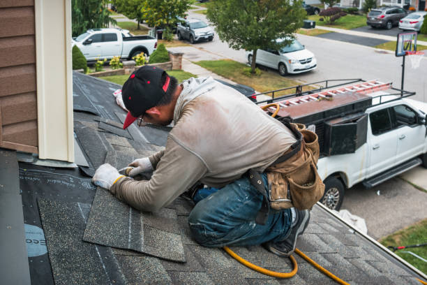 Professional Roof Replacement technician working in Revere, MA